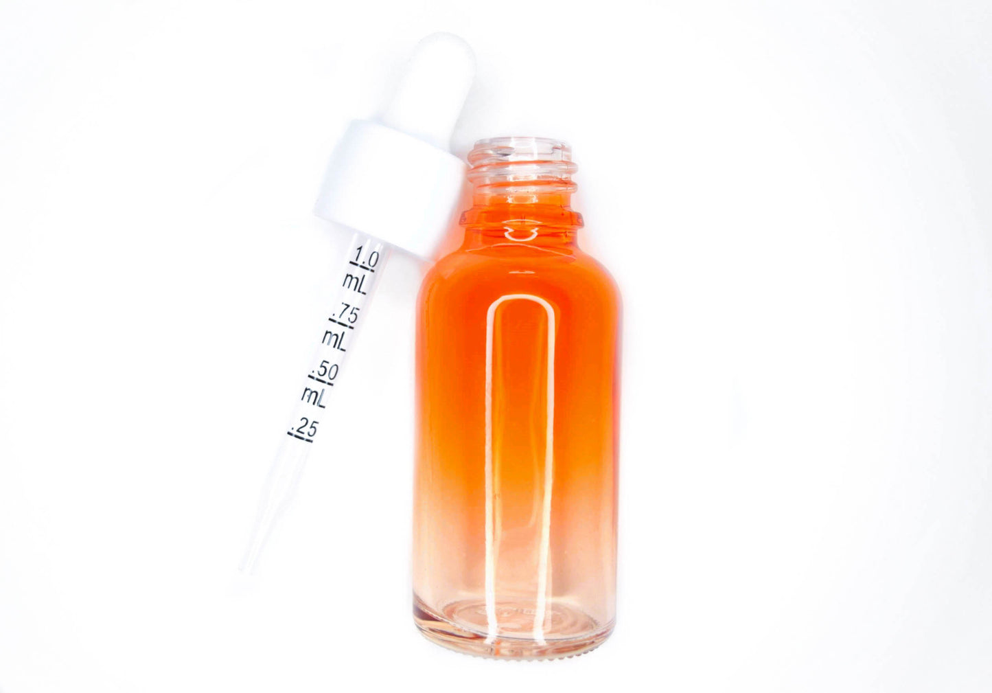 An orange bottle of a clear liquid used to break down the glue used to apply press on nails. A natural compound, 100% vegan, anti-fungal, orange scented remover.